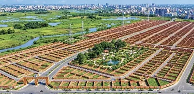 Artist's impression of Swapner Shahar from above: rows of plots, wide roads and a central park