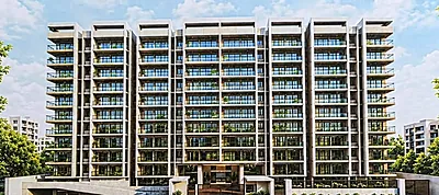 Inspiration image of a modern apartment block with landscaped grounds